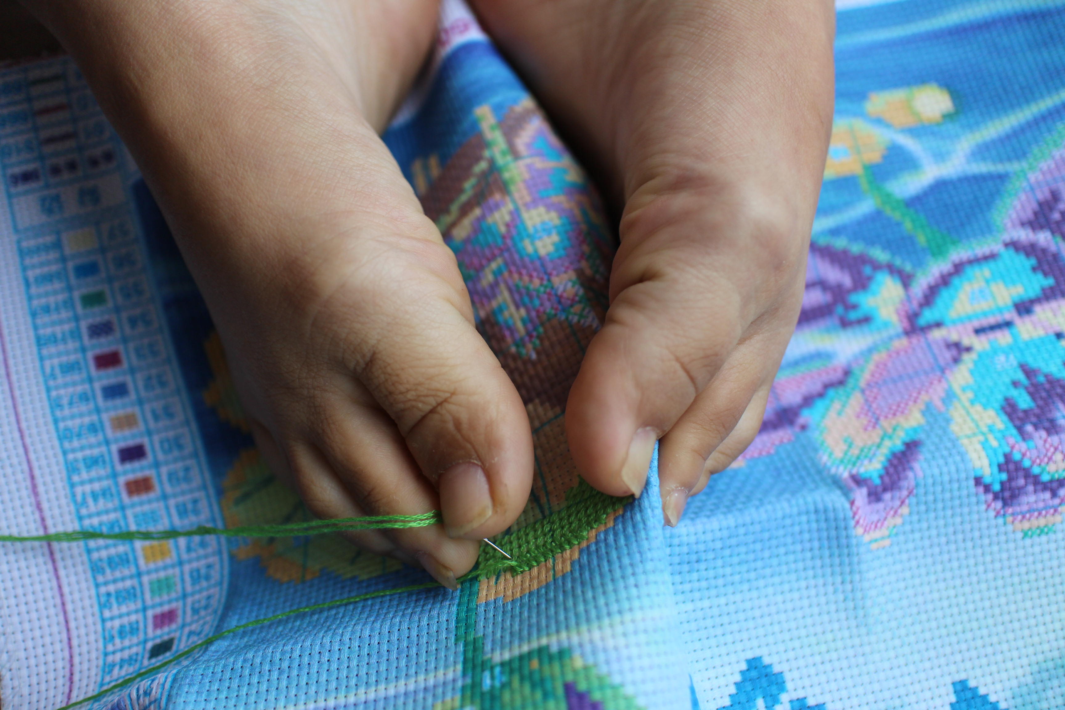 Woman with Disability Makes Embroidered Works with Feet | Shanghai Daily