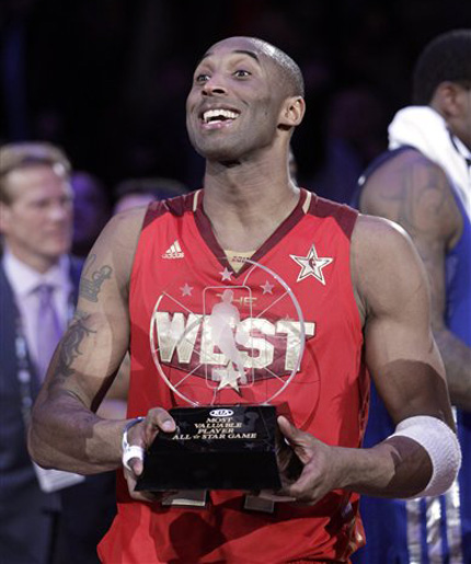 kobe holding trophy shirt