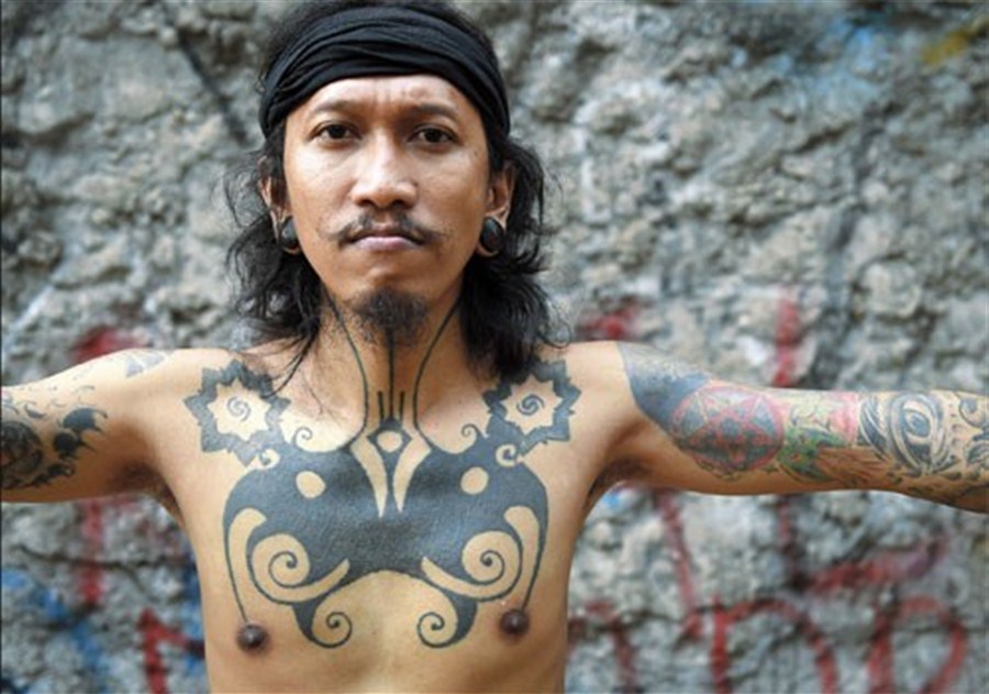 Balinese Tattoos  Symbols Designs Pictures  TATTLAS Bali Tattoo Guide 
