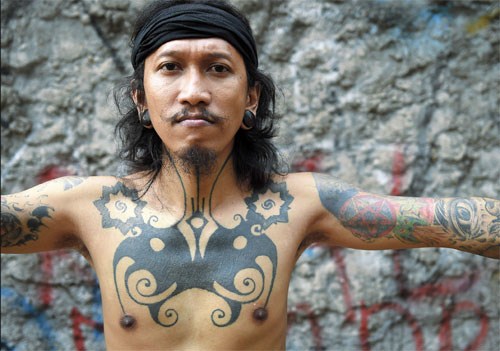 Indonesian tattooists revive tribal traditions | Shanghai Daily